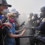 Australian reporter hit by rubber bullet on live TV in Los Angeles
