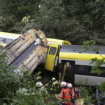 Germany: police say landslide after heavy rain likely caused train derailment
