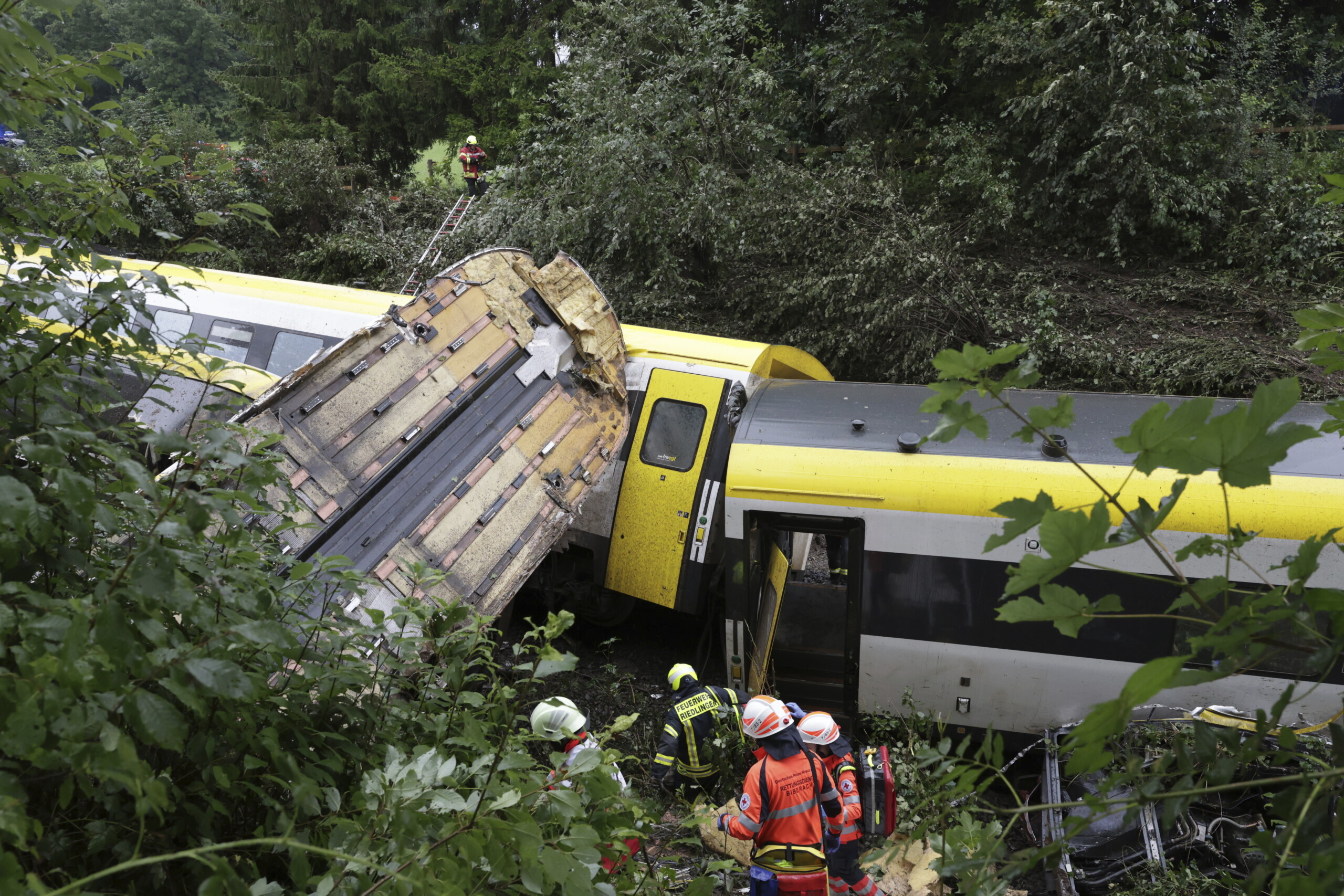 Germany: police say landslide after heavy rain likely caused train derailment