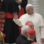 Pope: crosses Holy Door with Jubilee cross