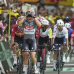 Tour de France: Philipsen wins sprint and takes first yellow jersey