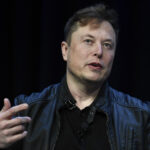 Wall Street down, Tesla loses 8% after Musk's announcement