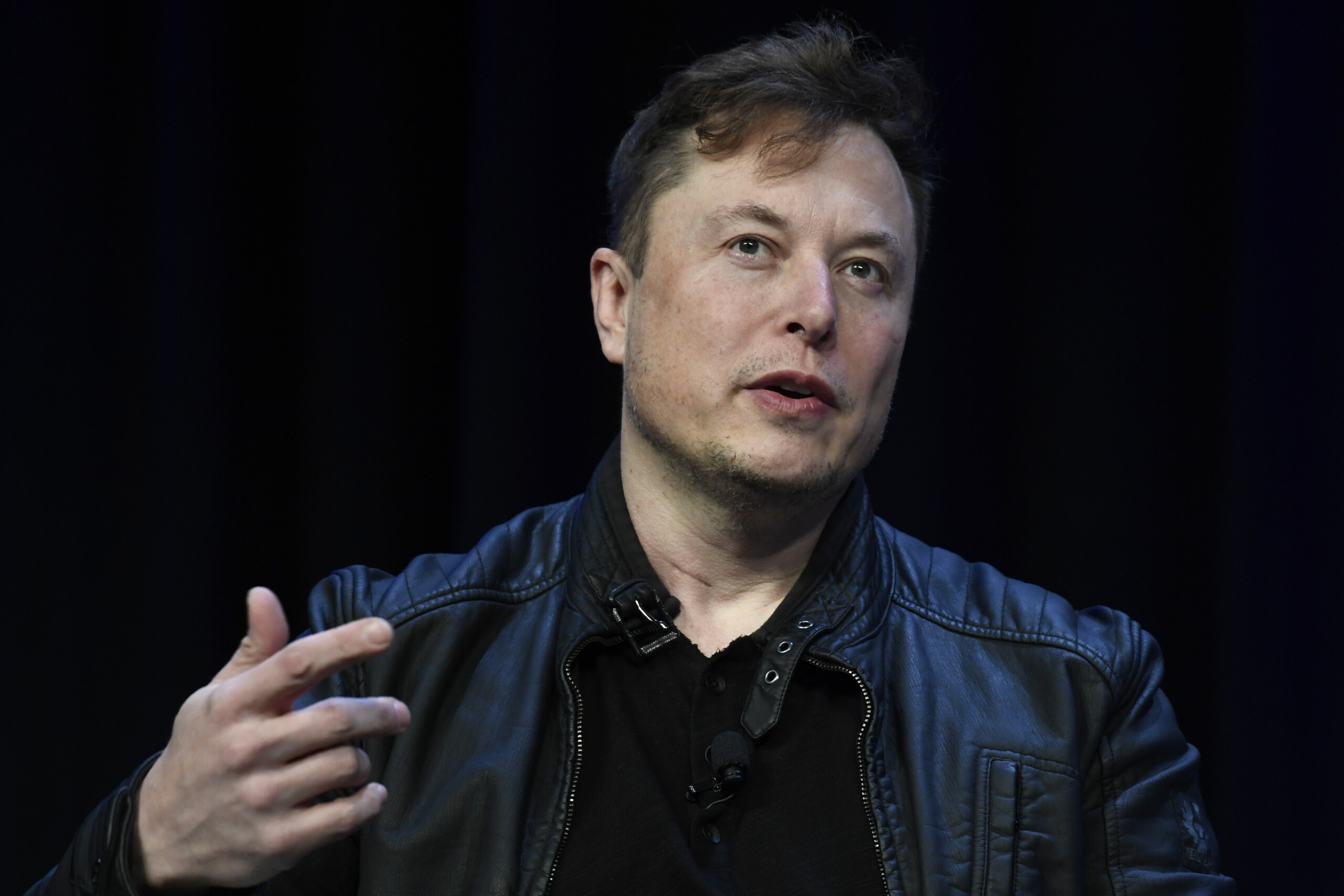 Wall Street down, Tesla loses 8% after Musk's announcement