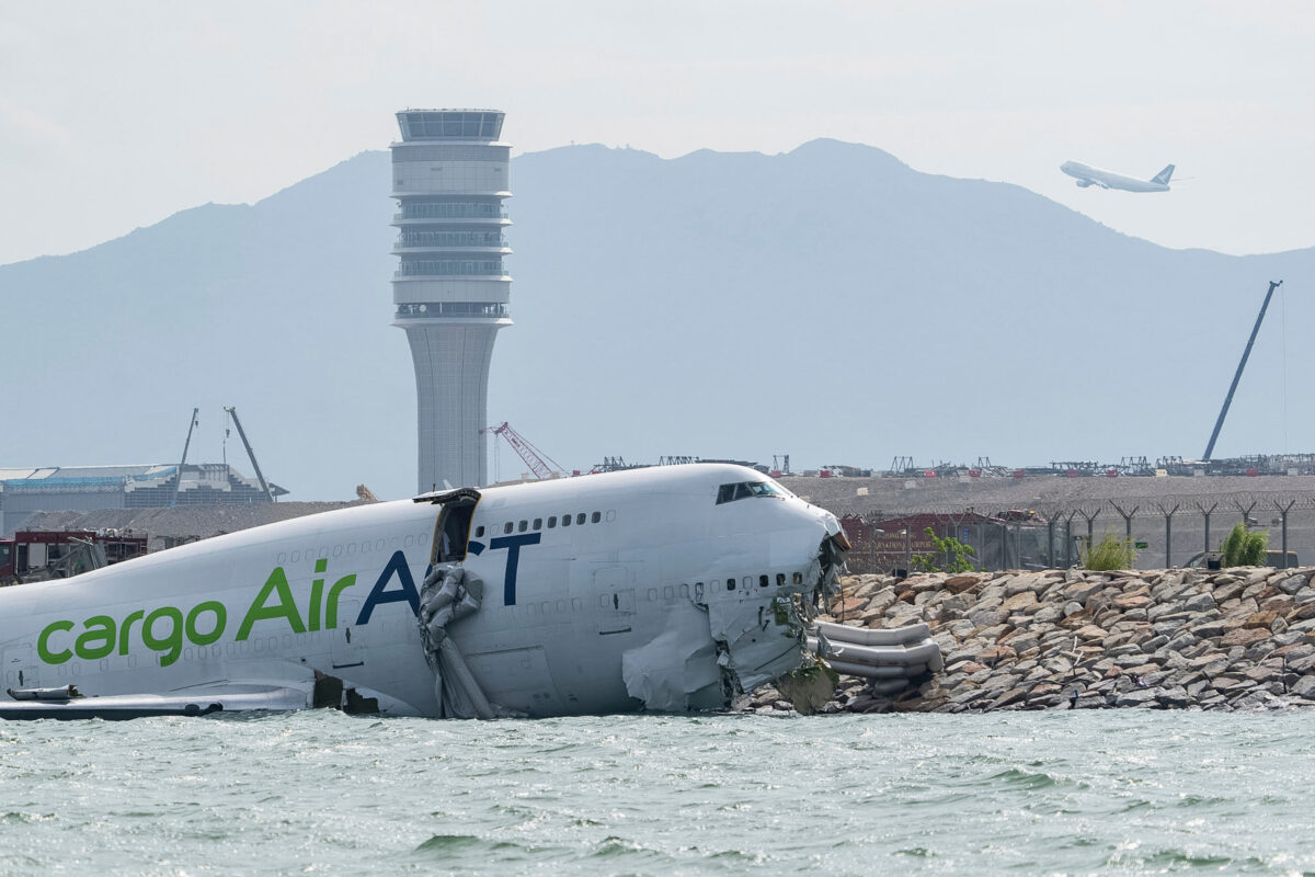 Hong Kong: cargo plane skids off runway, two dead Hong Kong: cargo plane skids off runway, two dead