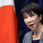 Japan government approves record $58 billion defence budget