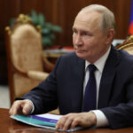 Russia, Putin signs law lowering citizenship oath age to 14