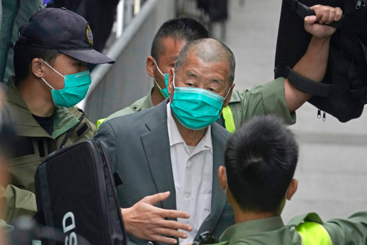 Hong Kong, pro-democracy tycoon Jimmy Lai sentenced to 20 years in prison