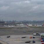 New York: collision on the runway at LaGuardia Airport between a plane and a service vehicle; flights suspended
