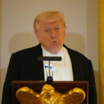Iran: Trump posts photo with a machine gun: ‘Tehran needs to wake up’